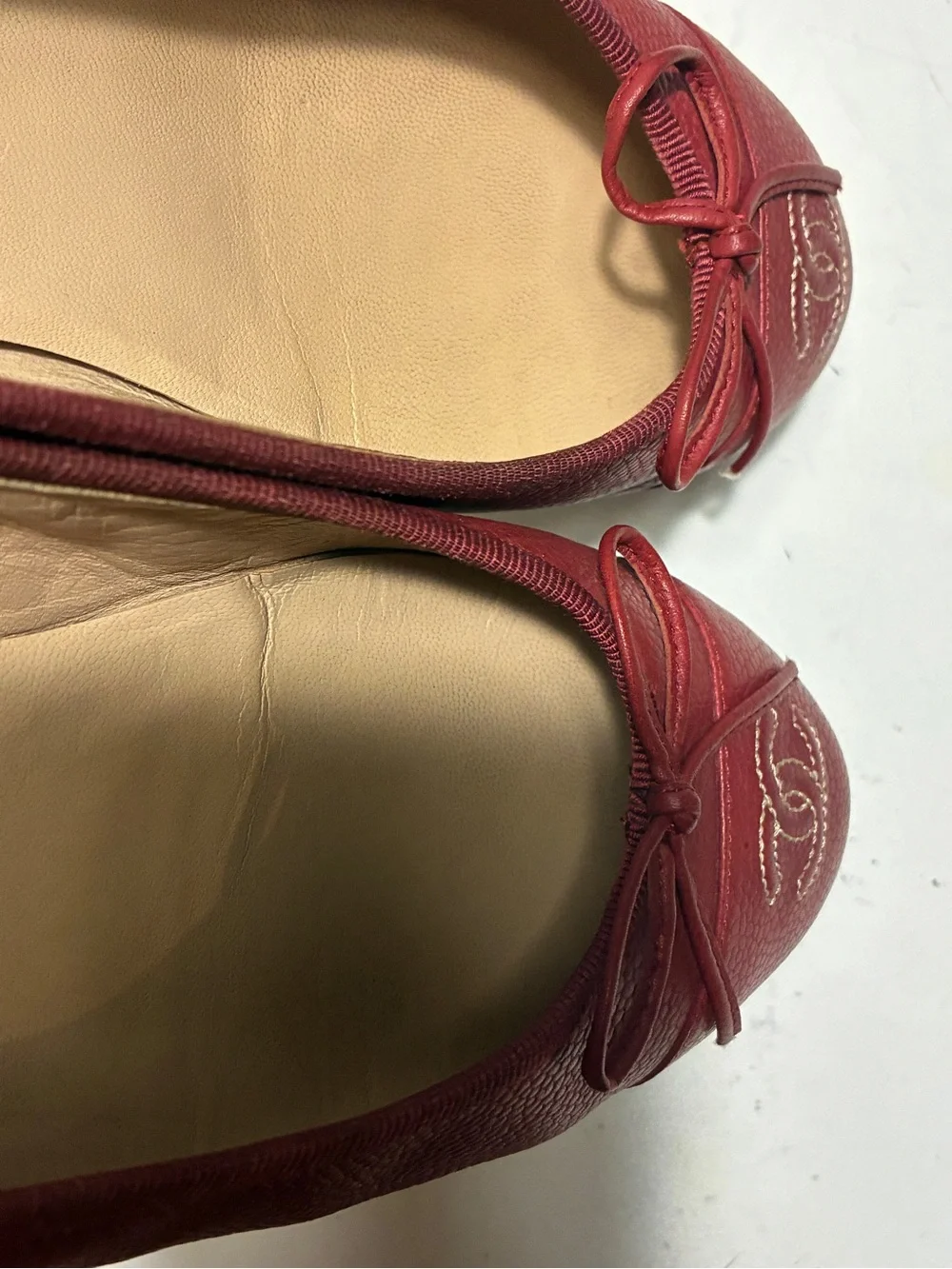 CHANEL Red caviar Leather Ballet Flats with Bow Detail